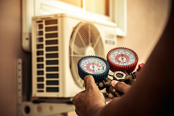Professional Hvac technician working in Quantico, VA